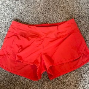 Lululemon orange athletic shorts